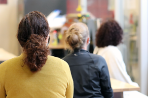 Students listen to a presentation at the UConn Learning Community Innovation Zone (July 2021)