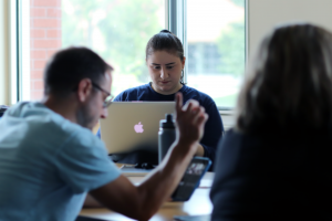 Two Summers students write a script for their group video (July 2021)